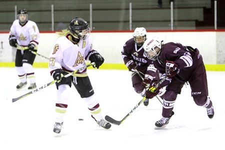 Huskies top Mounties 5-2 to move into first place