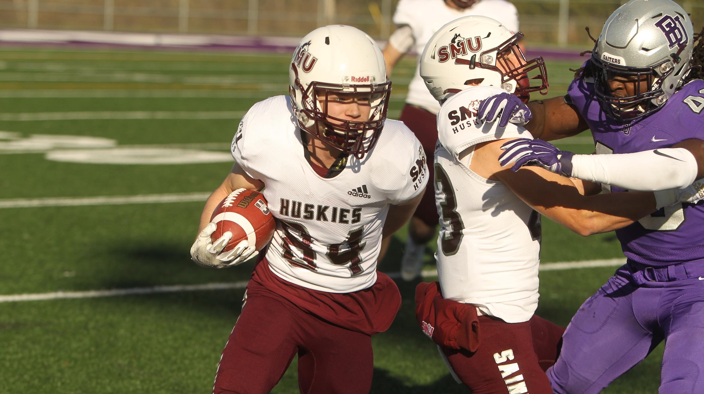 Chaloux runs past Huskies as Bishop’s secure playoff spot