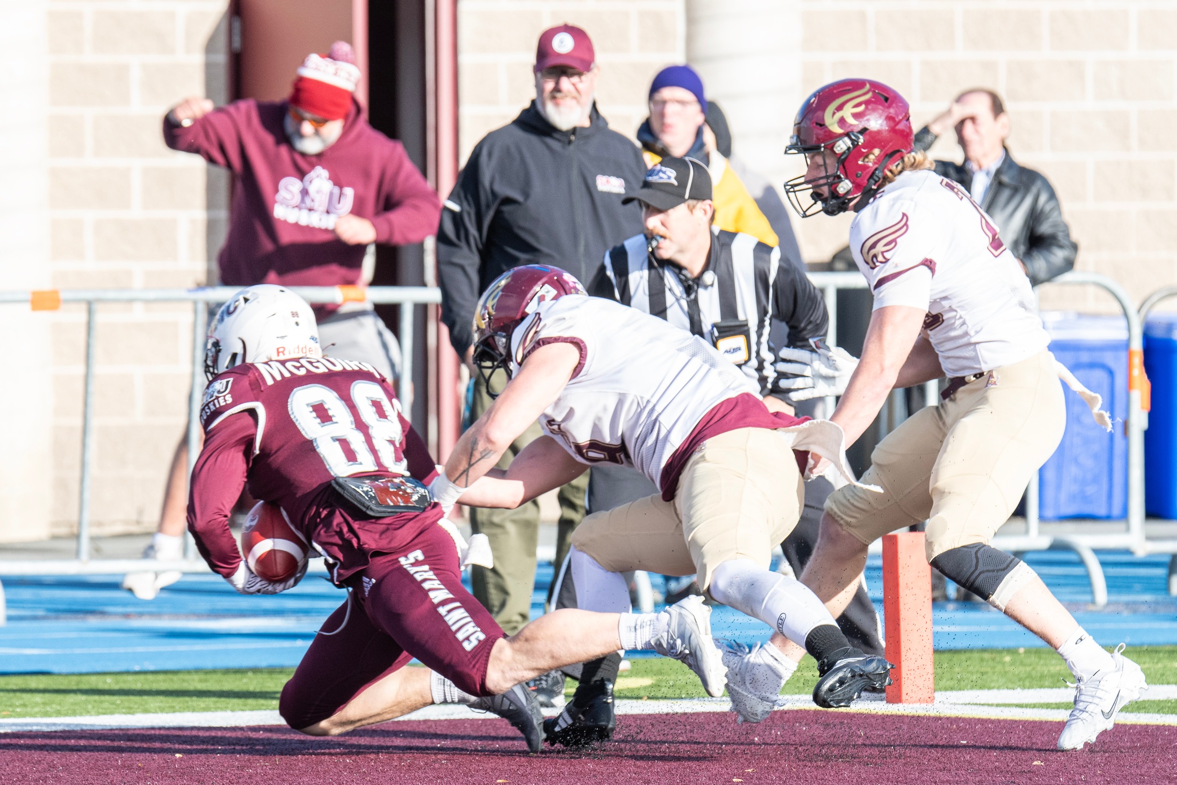 McGuirk catches game winning touchdown as Huskies defeat Mounties 15-8