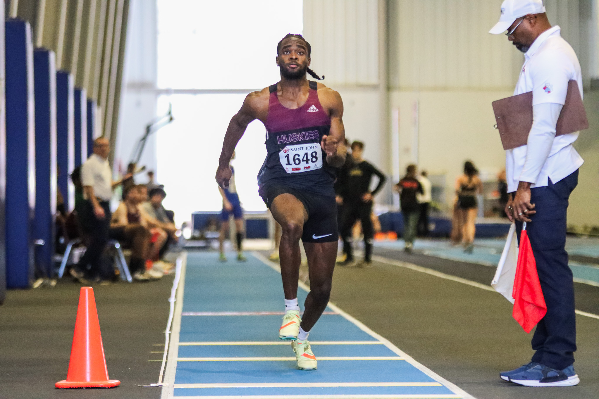 Smith wins 60m as Huskies record multiple podium finishes at UNB REDS Invitational Meet