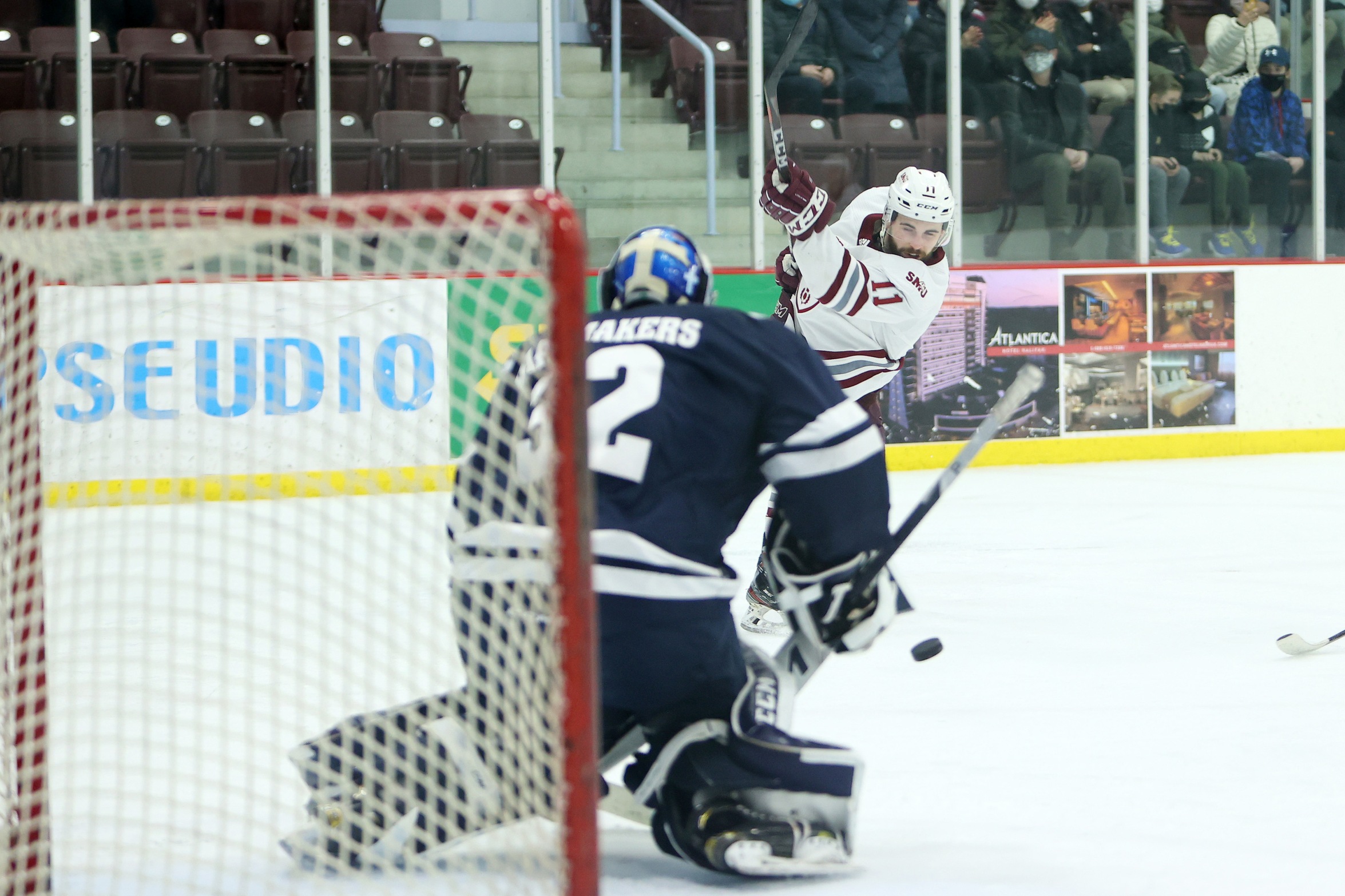 Saint Mary's forward Sam King fires a shot at St. FX X-Men goaltender Joseph Raaymakers during the X-Men 3-2 overtime win in game two of the AUS semi-finals, March 20, 2022 at the Dauphinee Centre in Halifax.