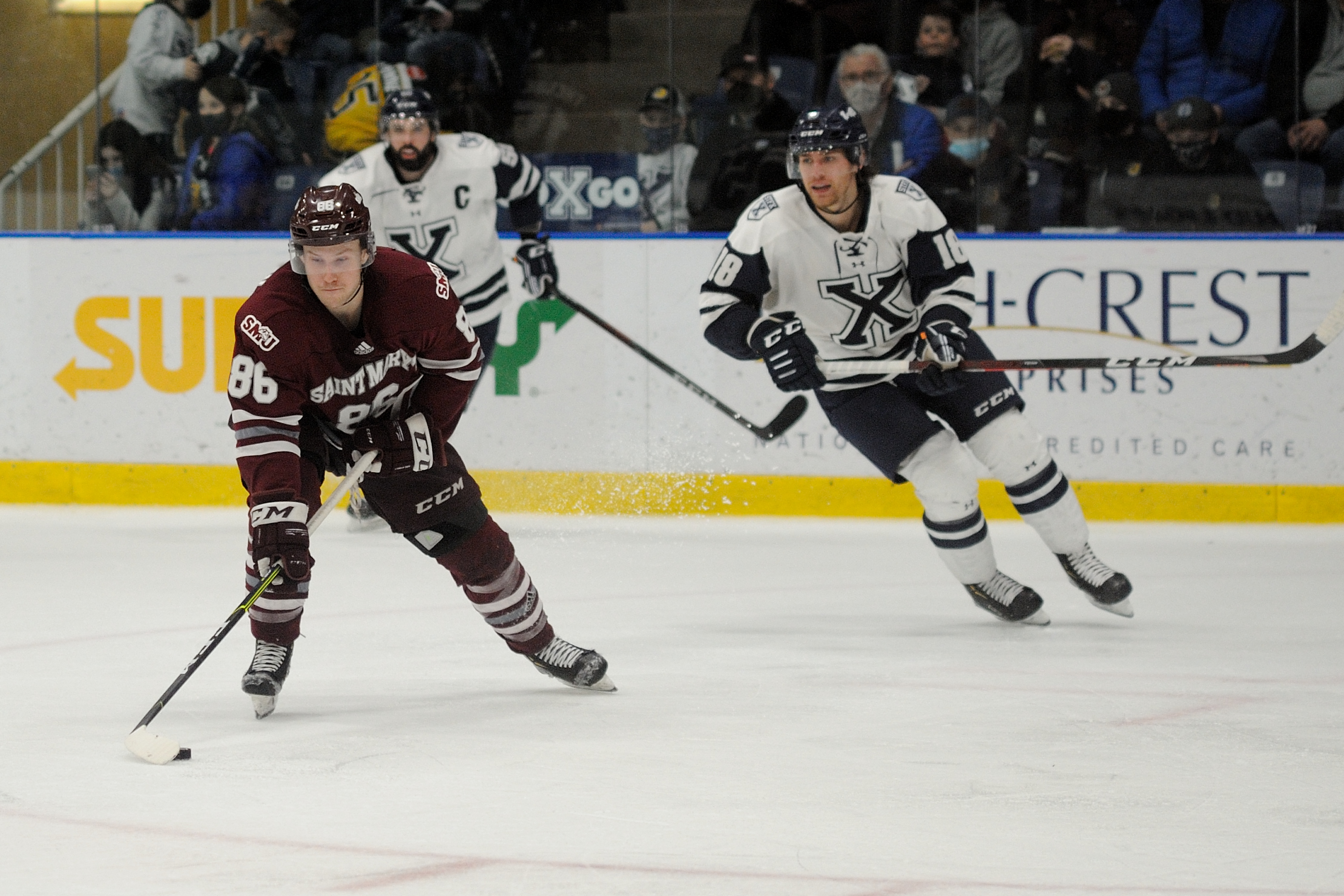 Huskies forward Bradey Johnson controls the puck in game one of the AUS semi-final. The St. FX X-Men defeated the Huskies 2-1 to take a one game lead in the best-of-three series.