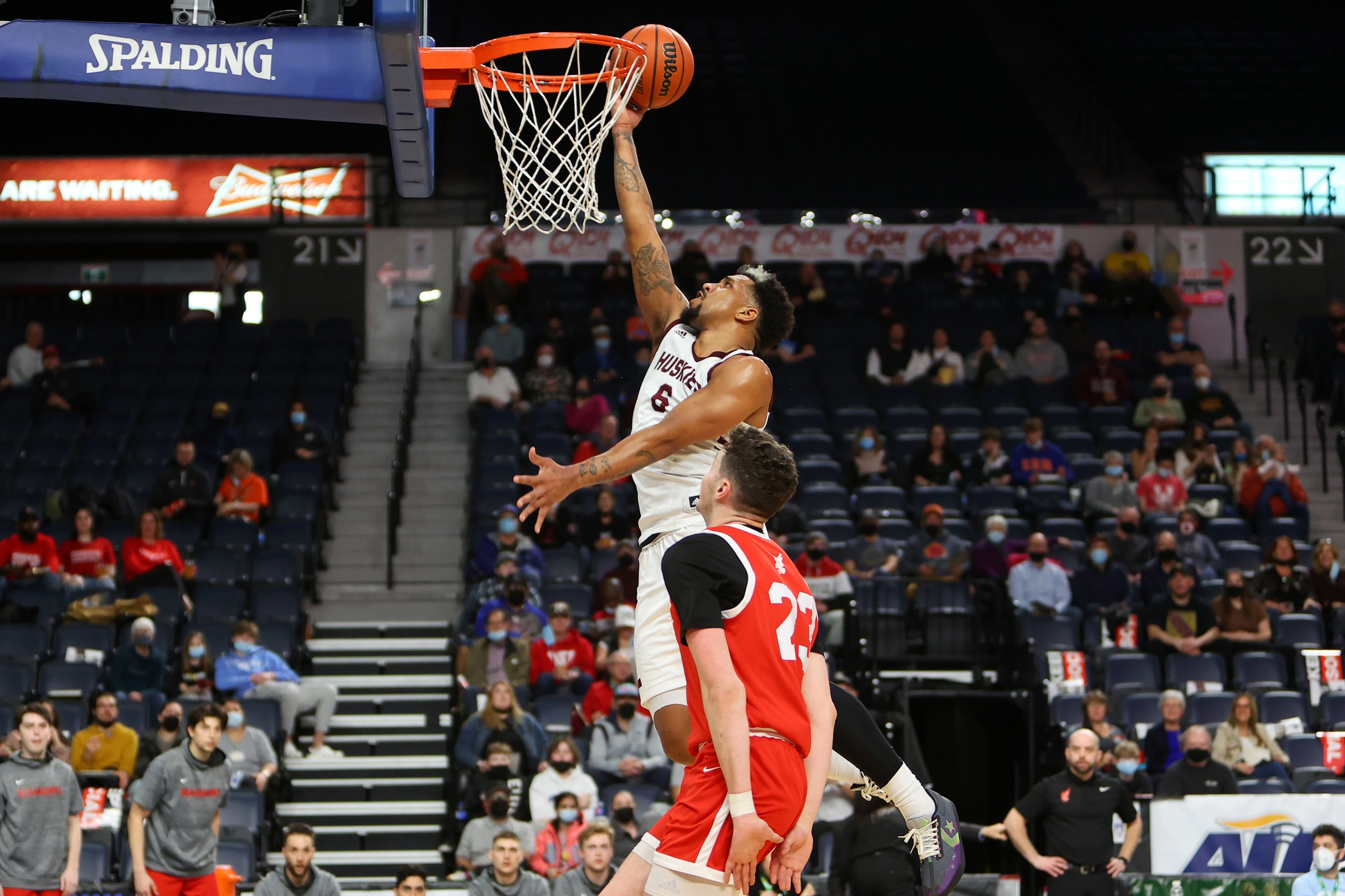 Nikita Kasongo lays up two of his 22 points in the Huskies 95-89 loss to the Memorial Sea-Hawks in the AUS Quarterfinal on March 18, 2022. (Photo by Nick Pearce / Atlantic University Sport)