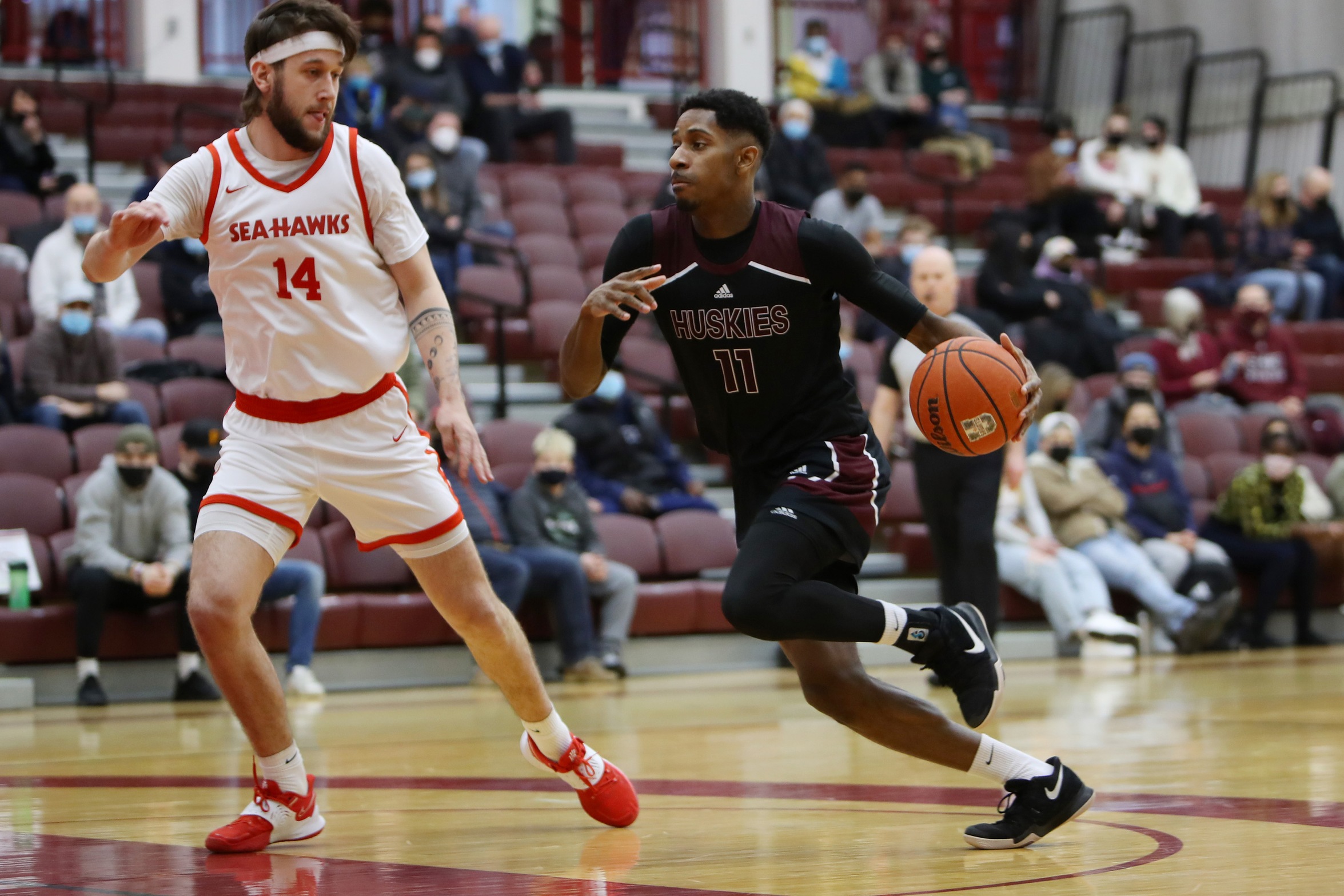 Huskies guard Dontae Mitchell drives against the Memorial Sea-Hawks. Mitchell was named Subway Player of the Game with 23 points in the Huskies 98-76 win on March 6, 2022.